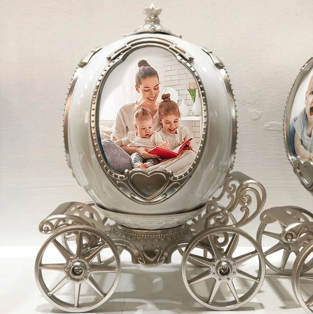 Rotating music box with souvenir photos