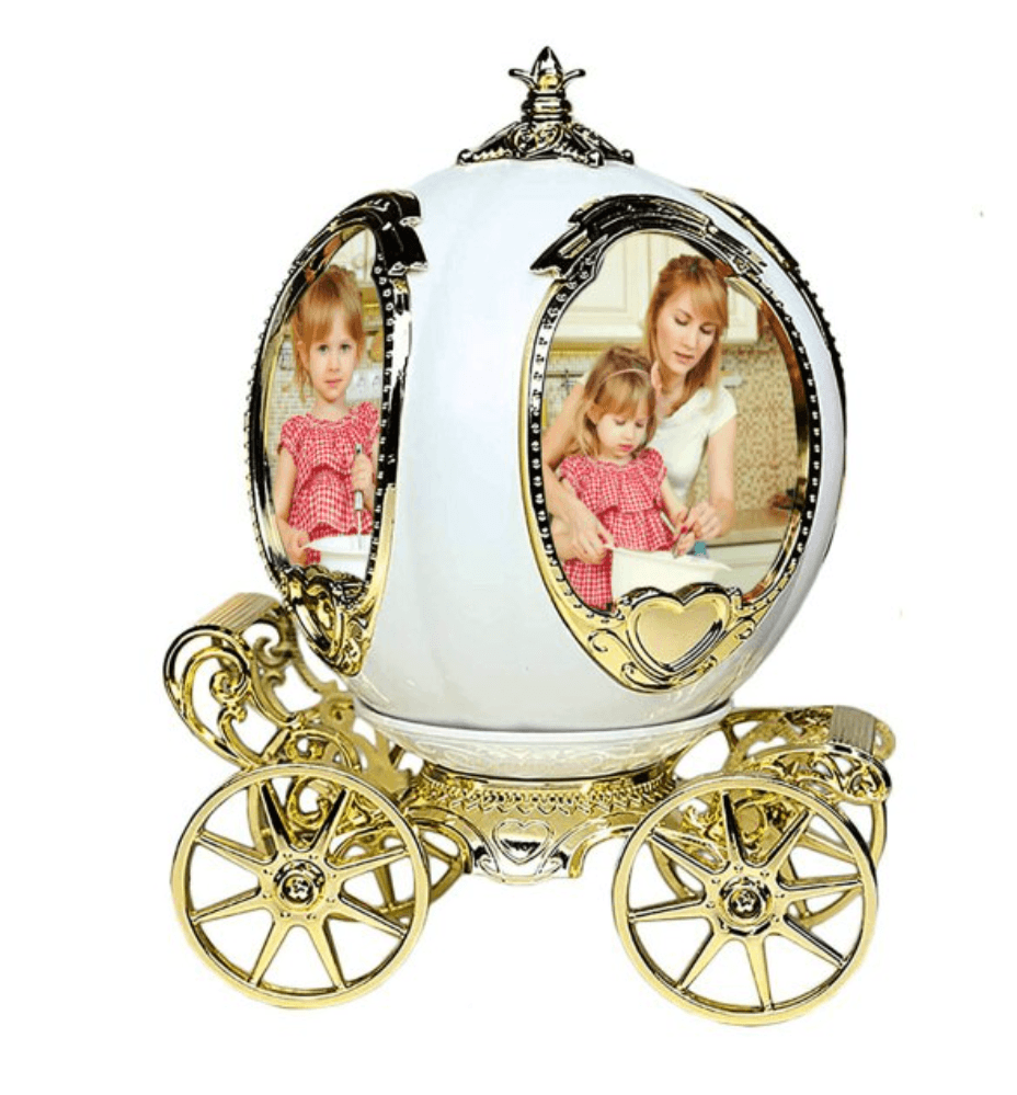 Rotating music box with souvenir photos