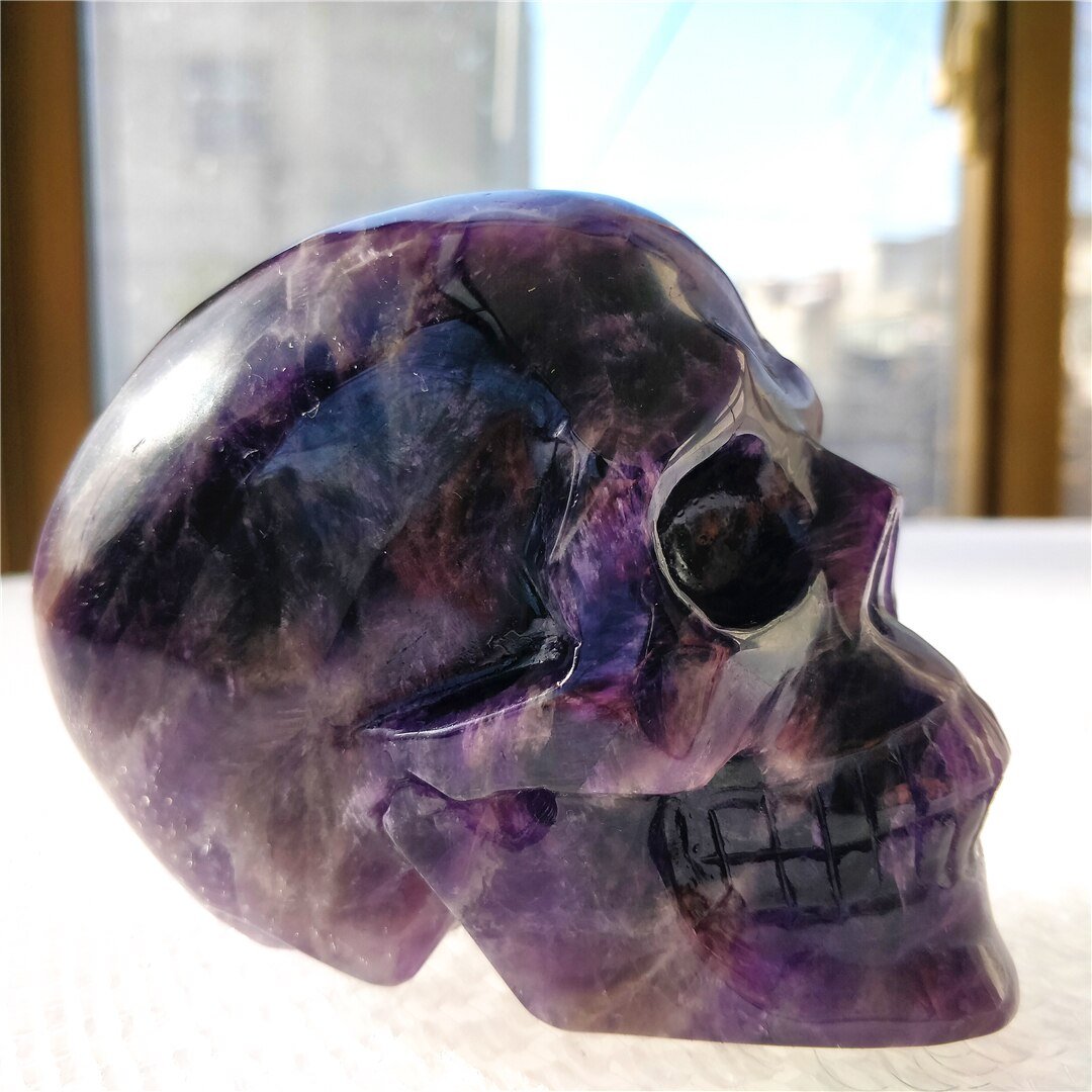 Hand carved skull Amethyst Brazilian Dream
